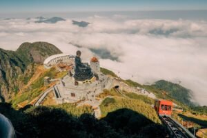 Buddha statue above a sea of clouds on Fansipan, Sapa