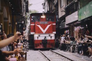 A train passing along Train Street in Hanoi