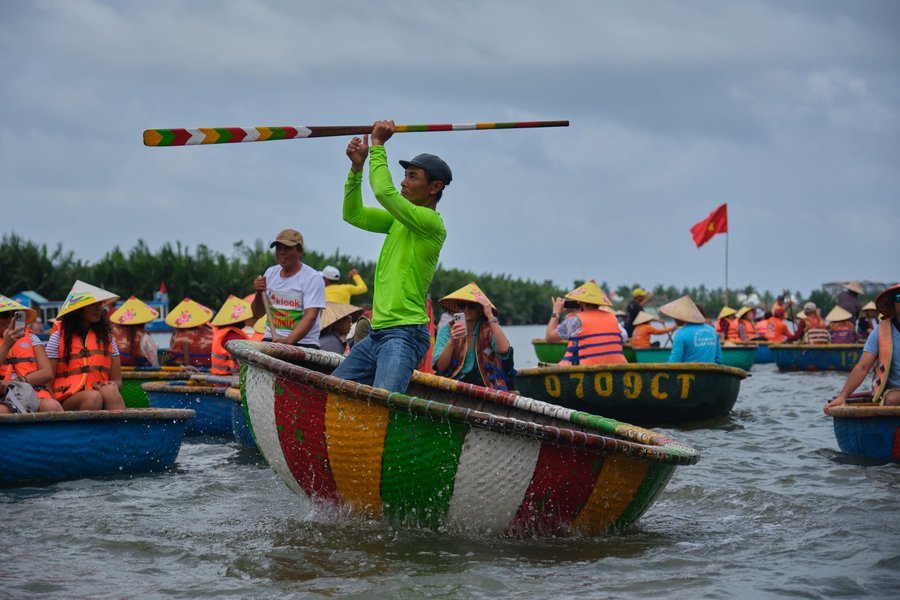 Basket boats in the Bay Mau coconut forest, Hoi An