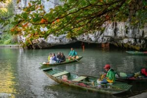 Boat passing through a cave at Trang An, Ninh Binh
